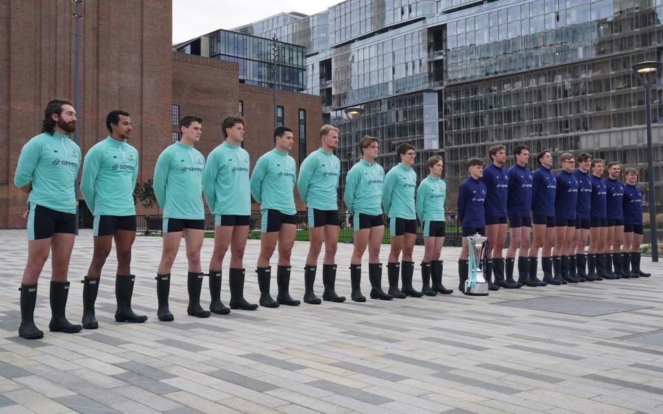 Oxford (right) and Cambridge (left) Universities' mens rowing teams attend a photo call during the crew announcements for The 2024 Gemini Boat Race at Battersea Power Station, London.