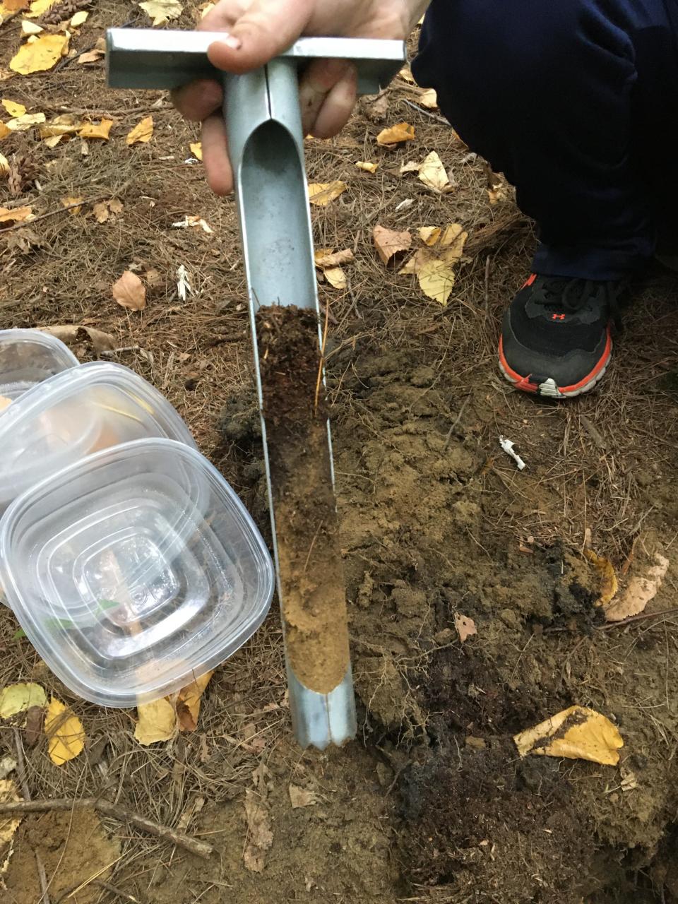 Students from Moharimet Elementary School and Mast Way Elementary School used rulers, magnifying glasses, soil color books, a microscope, and were even able to try out augers, shovels and soil corers to dig their own soil samples.