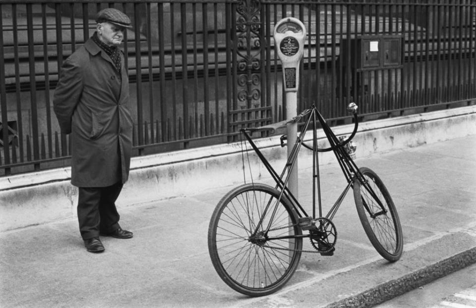 Balck and white archive of a man looking at a Dursely Pedersen