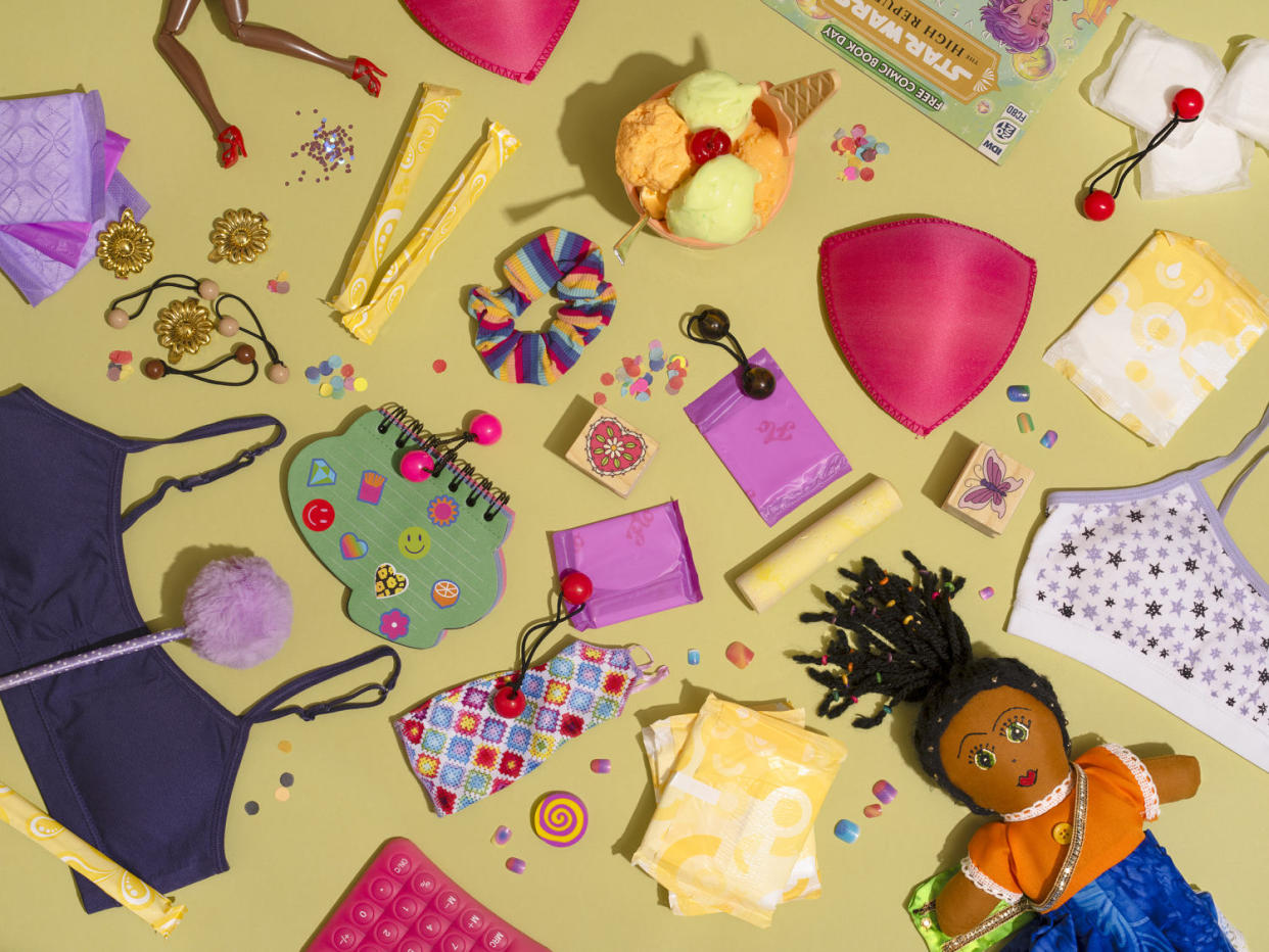 Photo illustration of various childhood, girlhood and puberty items including hair bobbles, scrunchies, a doll etc. (Nakeya Brown for NBC News)