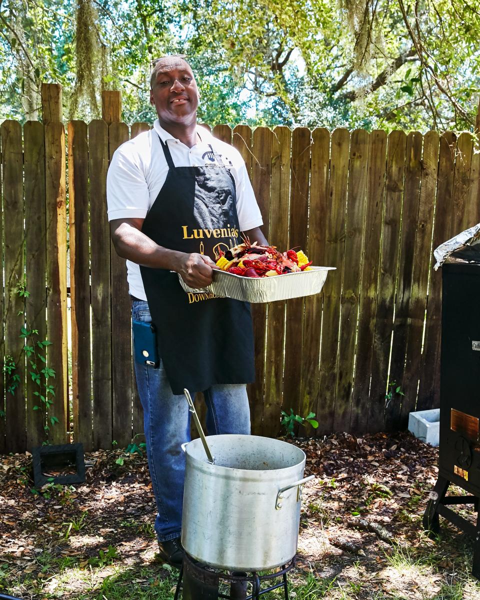 Isaiah Brown runs his late mother Luvenia's catering business on weekends in Brunswick, GA.