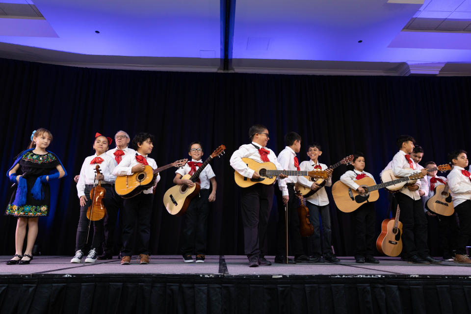 Students from Cesar Chavez Elementary School entertain attendees at the Read With Me Volunteers annual luncheon April 16, 2024.