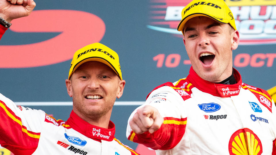 Alex Premat and Scott McLaughlin are pictured on the podium after winning the 2019 Bathurst 1000.