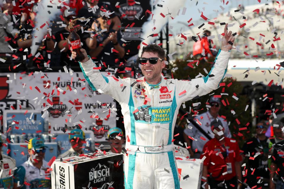 NASCAR Cup Series driver Denny Hamlin celebrates in victory lane after winning the Wurth 400 at Dover Motor Speedway.