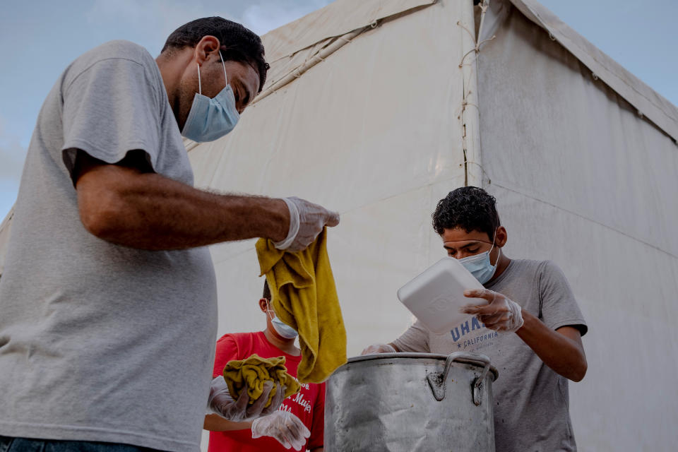 Dinner at the migrant camp in Matamoros on April 25. 