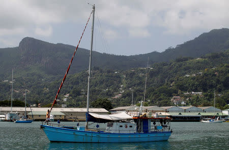 FILE PHOTO: A fisherman's boat is seen at Seychelles port February 29, 2012. REUTERS/Ahmed Jadallah/File Photo