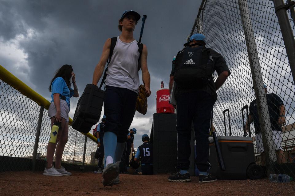 Valor Christian players exit the dugout during a lightning delay of their 5A state baseball tournament game against Rocky Mountain at All-City Park in Denver on Friday.