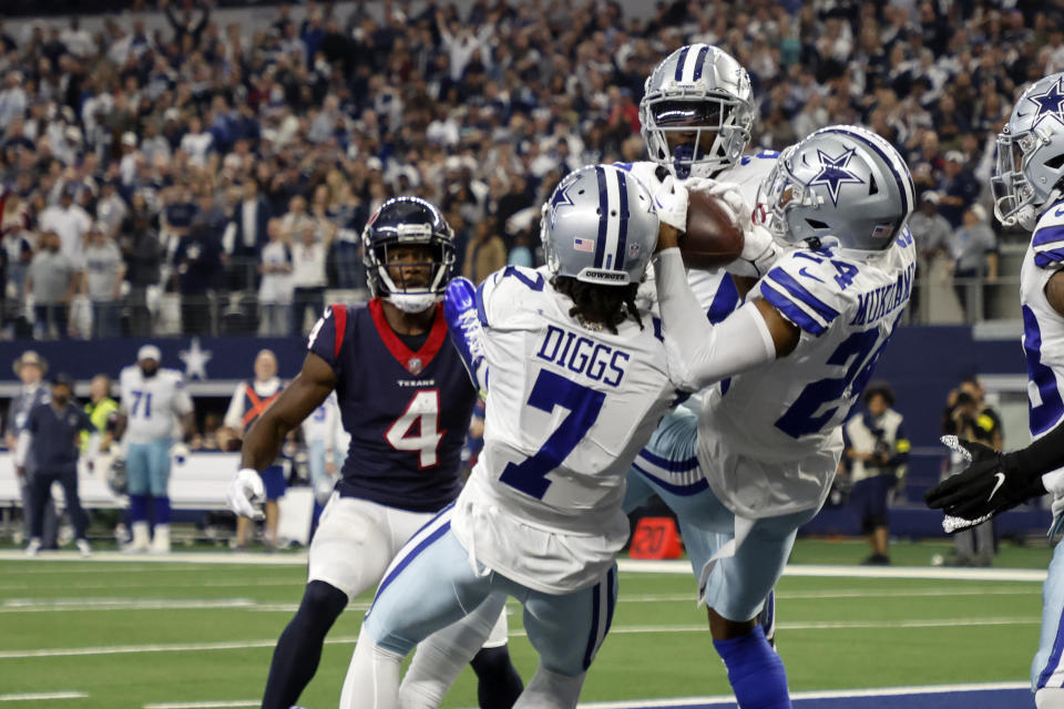 Dallas Cowboys safety Israel Mukuamu (24) intercepts a pass infant of Houston Texans wide receiver Phillip Dorsett (4) in the final seconds of their win over Houston Texans in an NFL football game, Sunday, Dec. 11, 2022, in Arlington, Texas. (AP Photo/Michael Ainsworth)