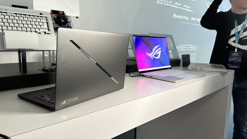 An ROG Zephyrus G14 laptop showing the main screen and outer lid.