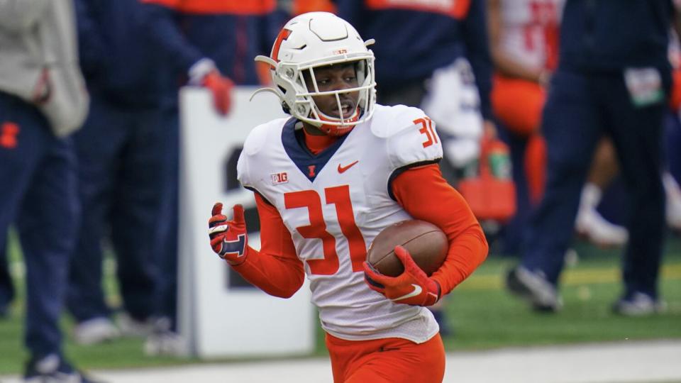 Illinois defensive back Devon Witherspoon runs with the ball during a game against Nebraska in November 2020.