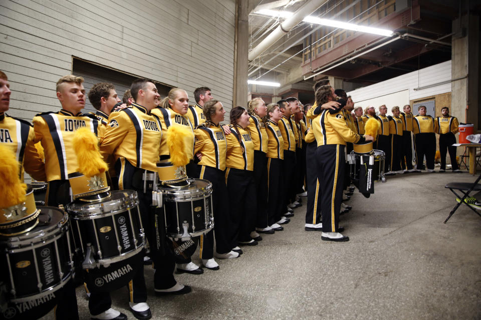 Members of the Iowa band sing before the start of an NCAA college football game between Iowa and Penn State Saturday, Sept. 23, 2017, in Iowa City, Iowa. (AP Photo/Jeff Roberson)