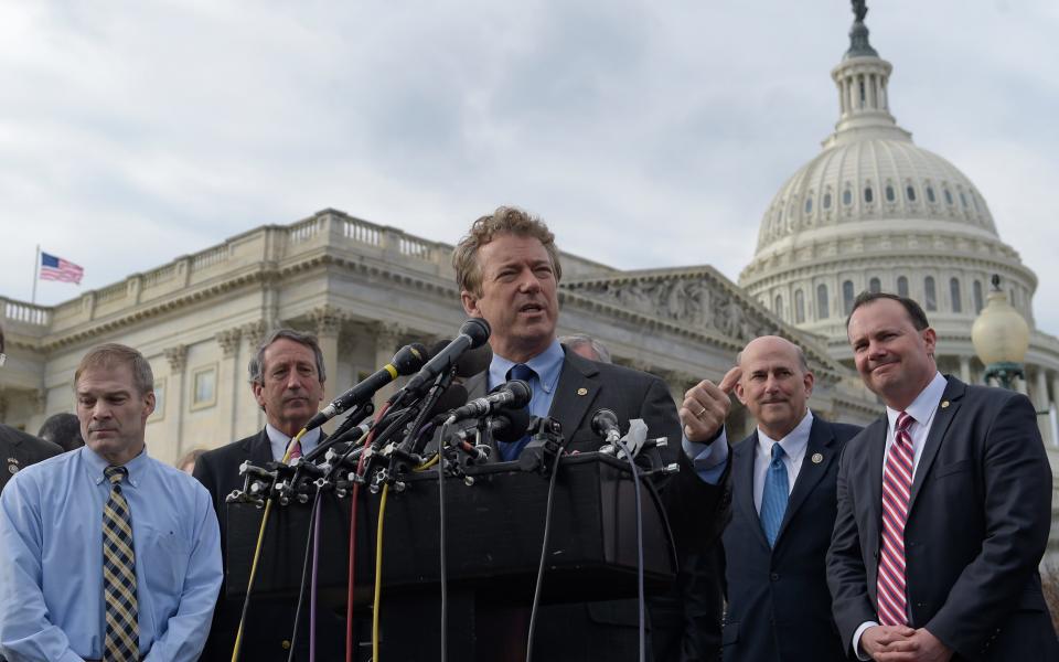 Rand Paul, centre, on Capitol Hill