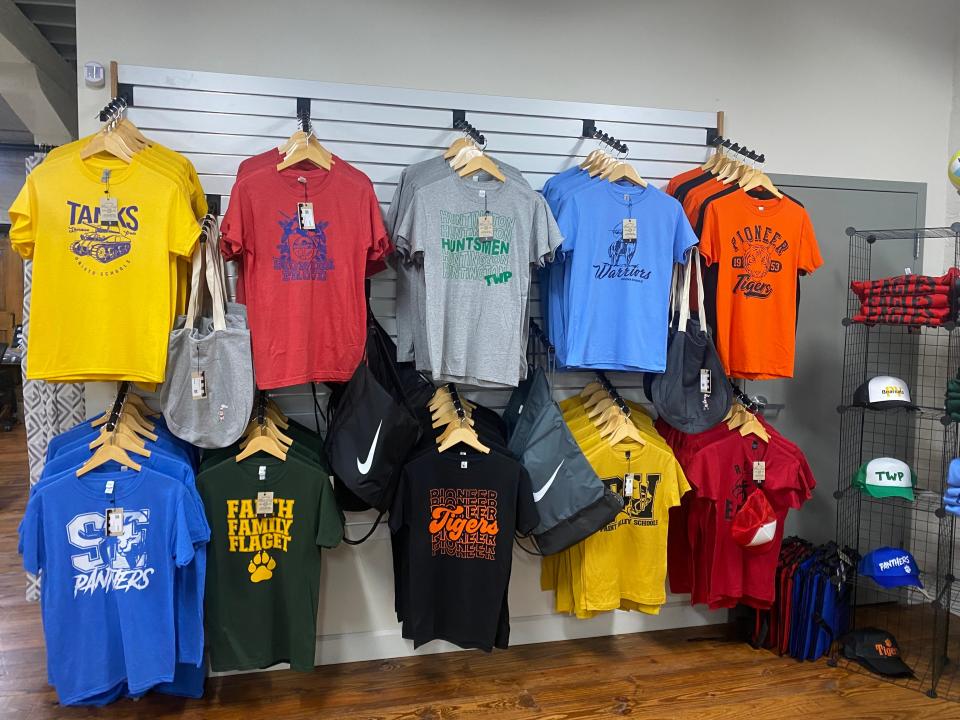 Chad McAllister and Jarrod DePugh of Mill City Apparel celebrated their grand opening on June 30, 2023, at 54 W Water St. The store features items from local schools.