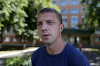 In this photo taken on Friday, Aug. 7, 2020, Pavel Paleichik, an ambulance doctor speaks during his interview with the Associated Press in the western city of Lida, Belarus. Paleichik, was handed a 7-day jail term and lost his job after complaining at an opposition rally about lack of protective gear. (AP Photo/Sergei Grits)