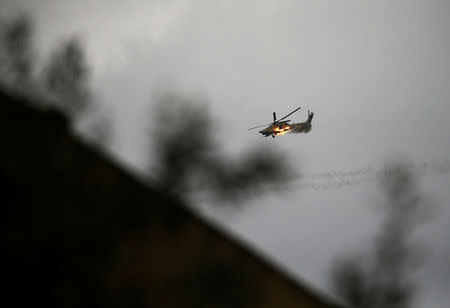 An Iraqi Air Force helicopter fires missiles against Islamic State militants during a battle in Mosul, Iraq March 19, 2017. REUTERS/Thaier Al-Sudani