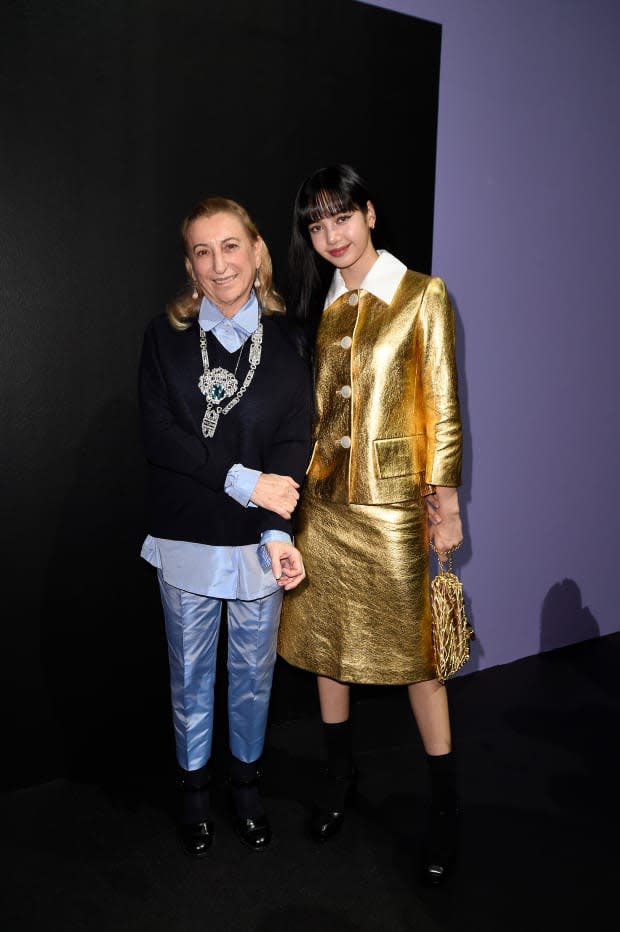 Lisa, a Global Ambassador for Celine (and a muse of Hedi Slimane) poses with Miuccia Prada at Prada's Fall 2020 runway show during Milan Fashion Week.