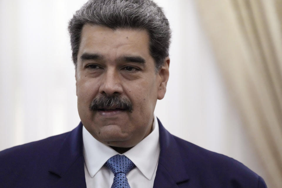 FILE - Venezuelan President Nicolas Maduro stands before a meeting at the presidential palace in Caracas, Venezuela, on July 11, 2022. For Venezuela, the fugitive nicknamed "Fat Leonard" at the center of a huge Navy bribery case who was arrested at an airport outside Caracas this week could become the latest bargaining chip in President Nicolas Maduro's efforts to win official recognition from the Biden administration, according to experts. (AP Photo/Ariana Cubillos, File)