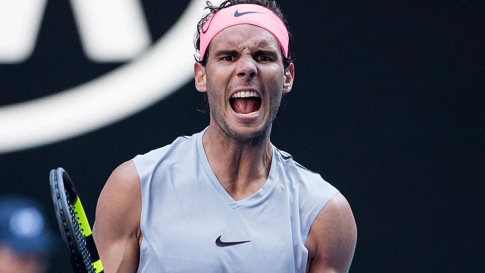 Spot the time as Dimitrov celebrates his win. Pic: Getty