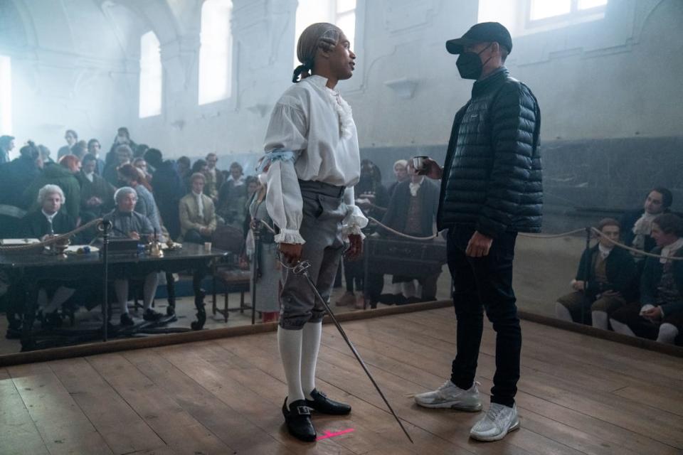 <div class="inline-image__caption"><p>Kelvin Harrison Jr. and Director Stephen Williams on the set of <em>Chevalier</em>. </p></div> <div class="inline-image__credit">Larry Horricks/Searchlight Pictures</div>