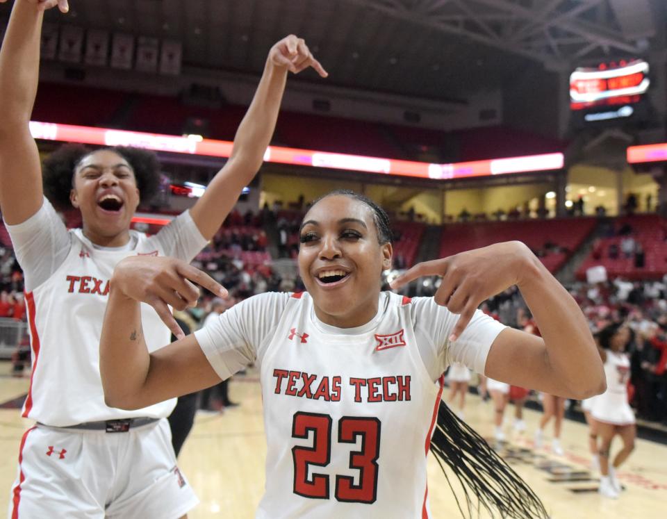 Texas Tech's guard Kilah Freelon, left, and Texas Tech's guard Bre'Amber Scott gestures "horns down" after defeating Texas in a Big 12 women's basketball game, Wednesday, Jan. 18, 2023, at United Supermarkets Arena, in Lubbock, Texas. Texas Tech won, 68-64.