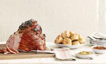 <p>Fete a crowd—sans stress—with this satisfying, make-ahead fare: sweet-and-spicy ham, mini cheesecakes, and more.</p><p><strong>Appetizer:</strong><br><a href="https://www.countryliving.com/food-drinks/recipes/a4267/lemon-goat-cheese-dip-recipe-clv1212/" rel="nofollow noopener" target="_blank" data-ylk="slk:Lemon Goat-Cheese Dip;elm:context_link;itc:0;sec:content-canvas" class="link ">Lemon Goat-Cheese Dip</a></p><p><strong>Main Course:</strong><br><a href="https://www.countryliving.com/food-drinks/recipes/a5440/sweet-spicy-cola-glazed-ham-recipe-clv1212/" rel="nofollow noopener" target="_blank" data-ylk="slk:Sweet-and-Spicy Cola-Glazed Ham;elm:context_link;itc:0;sec:content-canvas" class="link ">Sweet-and-Spicy Cola-Glazed Ham</a></p><p><strong>Side Dish:<br></strong><a href="https://www.countryliving.com/food-drinks/recipes/a4268/cheddar-biscuits-recipe-clv1212/" rel="nofollow noopener" target="_blank" data-ylk="slk:Cheddar Biscuits;elm:context_link;itc:0;sec:content-canvas" class="link ">Cheddar Biscuits</a></p><p><a href="https://www.countryliving.com/food-drinks/recipes/a36647/orange-carrots-yogurt-parsley-dressing/" rel="nofollow noopener" target="_blank" data-ylk="slk:Orange Carrots with Yogurt Parsley Dressing;elm:context_link;itc:0;sec:content-canvas" class="link ">Orange Carrots with Yogurt Parsley Dressing</a></p><p><a href="https://www.countryliving.com/food-drinks/recipes/a5858/roasted-acorn-squash-maple-bacon-drizzle-recipe-clx1114/" rel="nofollow noopener" target="_blank" data-ylk="slk:Roasted Acorn Squash with Maple-Bacon Drizzle;elm:context_link;itc:0;sec:content-canvas" class="link ">Roasted Acorn Squash with Maple-Bacon Drizzle</a></p><p><strong>Dessert:<br></strong><a href="https://www.countryliving.com/food-drinks/recipes/a4270/mini-brown-sugar-cheesecakes-recipe-clv1212/" rel="nofollow noopener" target="_blank" data-ylk="slk:Mini Brown-Sugar Cheesecakes;elm:context_link;itc:0;sec:content-canvas" class="link ">Mini Brown-Sugar Cheesecakes</a></p><p><strong>Drink:</strong><br><a href="https://www.countryliving.com/food-drinks/recipes/a4280/sparkling-winter-sangria-recipe-clv1212/" rel="nofollow noopener" target="_blank" data-ylk="slk:Sparkling Winter Sangria;elm:context_link;itc:0;sec:content-canvas" class="link ">Sparkling Winter Sangria</a></p>