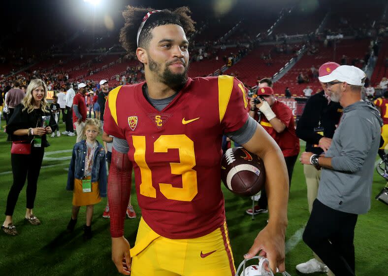 LOS ANGELES, CALIF. - OCT. 1, 2022. USC quarterback Caleb Williams walks off the field.