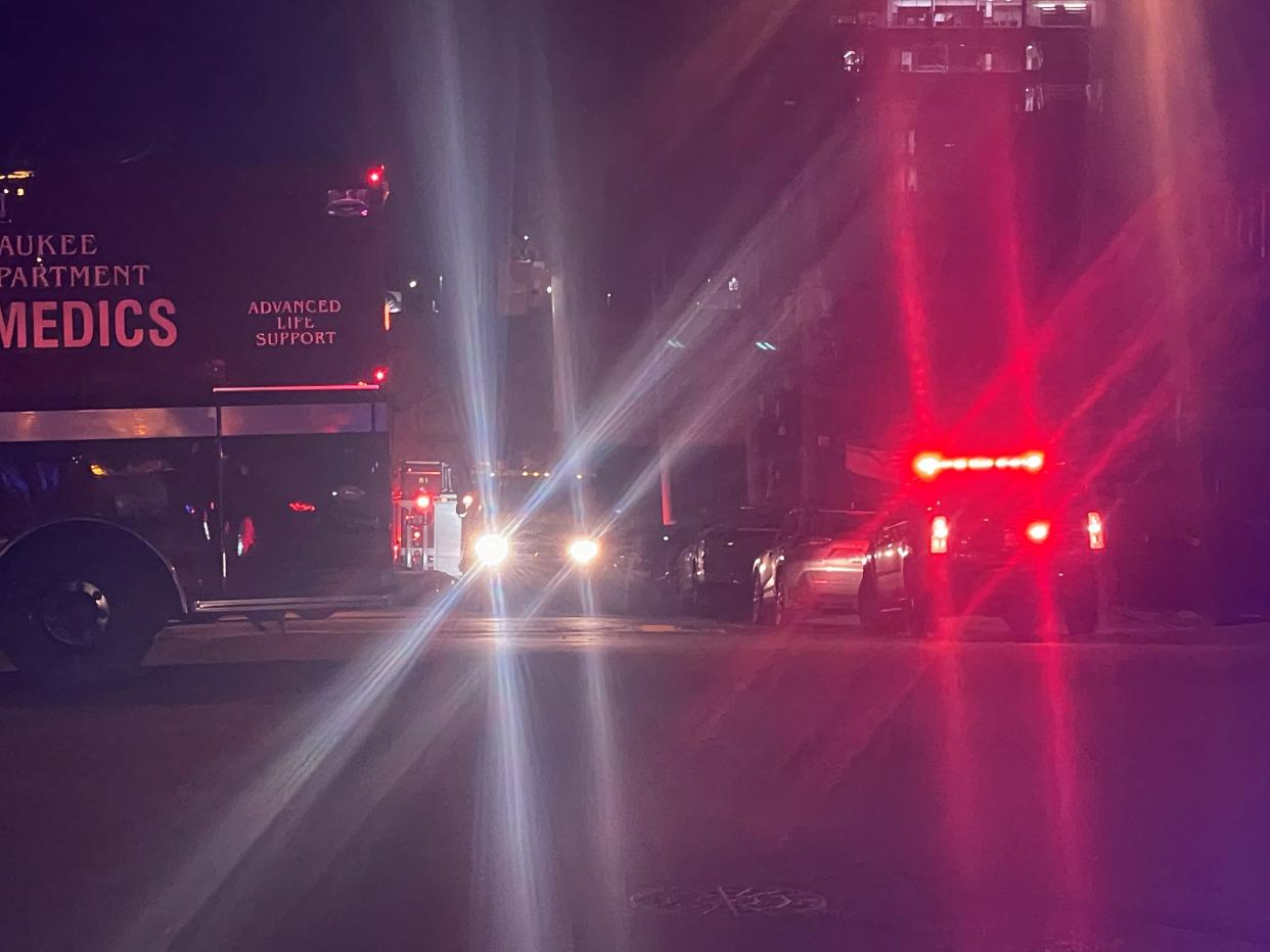 Milwaukee Fire Department reports that a vehicle crashed into a building and caught fire. The Milwaukee County Medical Examiner's Office has reported to the scene.