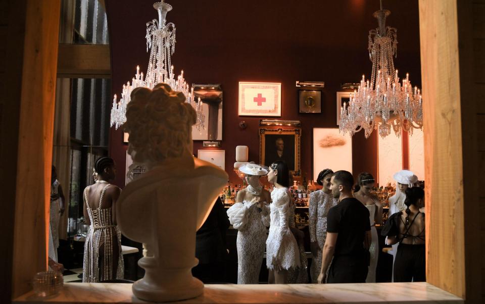 The Baccarat Hotel in New York is filled with distinctive and highly decorative chandeliers