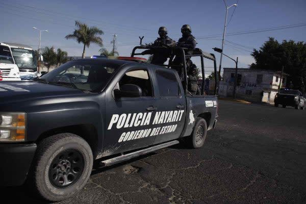 La Policía de Nayarit patrulla las calles durante una de las épocas más violentas del estado. Foto: Hugo Cervantes