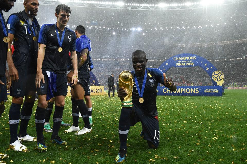 France’s midfielder N’Golo Kante poses with the World Cup trophy during the trophy ceremony at the end of the Russia 2018 World Cup final football match between France and Croatia at the Luzhniki Stadium in Moscow on July 15, 2018. (Photo by FRANCK FIFE / AFP) / RESTRICTED TO EDITORIAL USE – NO MOBILE PUSH ALERTS/DOWNLOADS (Photo credit should read FRANCK FIFE/AFP/Getty Images)