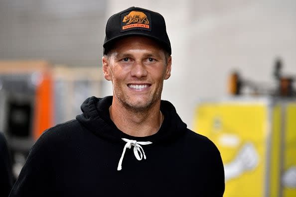 JACKSONVILLE, FLORIDA - APRIL 24: Tampa Bay Buccaneers quarterback Tom Brady arrives backstage during the UFC 261 event at VyStar Veterans Memorial Arena on April 24, 2021 in Jacksonville, Florida. (Photo by Chris Unger/Zuffa LLC)