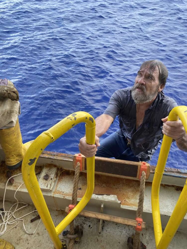 Stuart Bee boarding container ship Angeles after being stranded at sea.