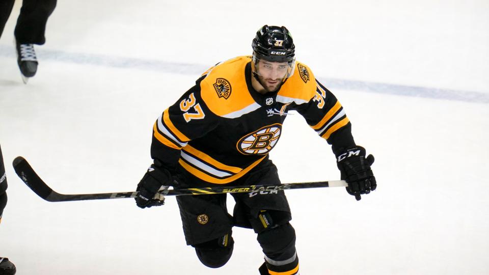 Boston Bruins center Patrice Bergeron skates during the third period of an NHL hockey game against the Pittsburgh Penguins in Pittsburgh, Thursday, April 21, 2022. The Penguins won 4-0.(AP Photo/Gene J. Puskar)