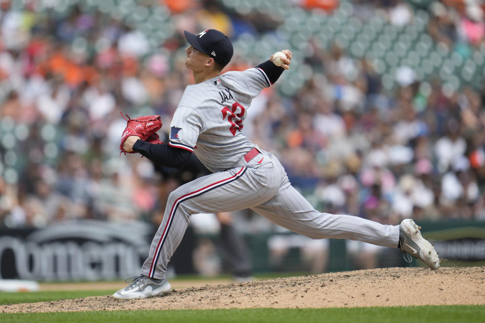 Minnesota Twins relief pitcher Griffin Jax (22) throws against the Detroit Tigers in the ninth inning of a baseball game, Sunday, June 25, 2023, in Detroit. (AP Photo/Paul Sancya)