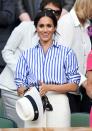 <p>The newlywed wore a classic blue-striped button-down shirt and crisp white wide-leg trousers from Ralph Lauren to Wimbledon, July 2018. </p>