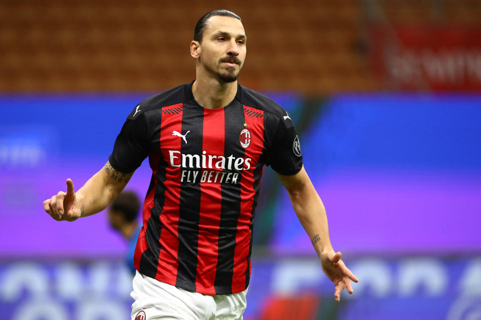 MILAN, ITALY - OCTOBER 26:  Zlatan Ibrahimovic of AC Milan celebrates after scoring the opening goal during the Serie A match between AC Milan and AS Roma at Stadio Giuseppe Meazza on October 26, 2020 in Milan, Italy.  (Photo by Marco Luzzani/Getty Images)