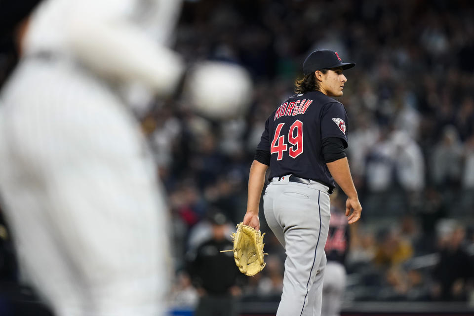 Cleveland Guardians starting pitcher Eli Morgan (49) reacts as New York Yankees' Aaron Judge runs the bases after hitting a two-run home run during the third inning of a baseball game Friday, April 22, 2022, in New York. (AP Photo/Frank Franklin II)