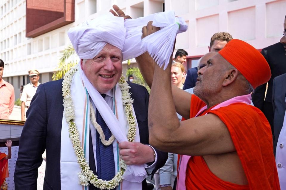 Mr Johnson was dressed in a turban during a visit to Gujarat Biotechnology University (Stefan Rousseau/PA) (PA Wire)