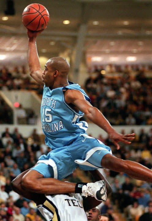 North Carolina’s Vince Carter (15) drives to the basket over Georgia Tech’s Travis Spivey (11) during first half in Atlanta Sunday, Feb. 8, 1998. North Carolina won 107-100 in a double overtime. (AP Photo/Alan Mothner)