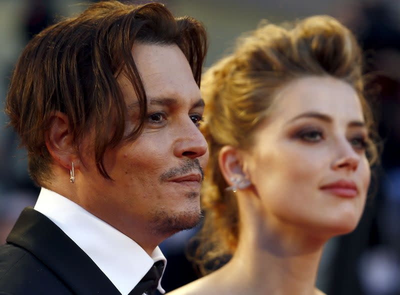 FILE PHOTO: Actress Amber Heard and her husband Johnny Depp attend the red carpet event for the movie "The Danish Girl" at the 72nd Venice Film Festival