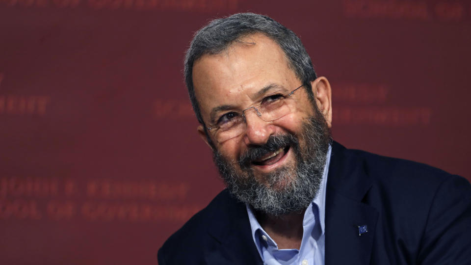 FILE - In this Sept. 21, 2016 file photo, former Israeli Prime Minister Ehud Barak smiles during a lecture at the John F. Kennedy School of Government at Harvard University in Cambridge, Mass. In a joint statement Thursday, "The Democratic Camp" says it would be made up of former Prime Minister Ehud Barak's "Democratic Israel" faction, the dovish Meretz party and senior Labor Party official Stav Shaffir. Together, the group aims to pose a powerful contrast to Prime Minister Benjamin Netanyahu's conservative ruling Likud party. (AP Photo/Charles Krupa< File)