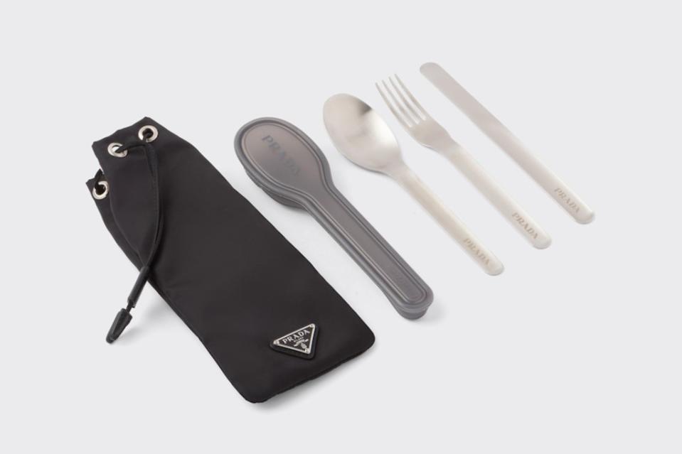 And if the nylon lunch bag alone isn’t enough, Prada also sells a stainless steel cutlery set for $480. Prada