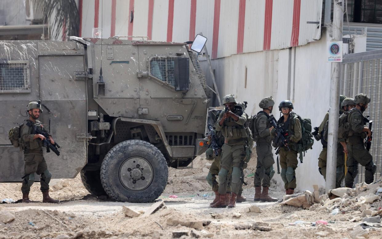 Israeli soldiers operate during a raid in the Nur Shams camp for Palestinian refugees near the city of Tulkarem