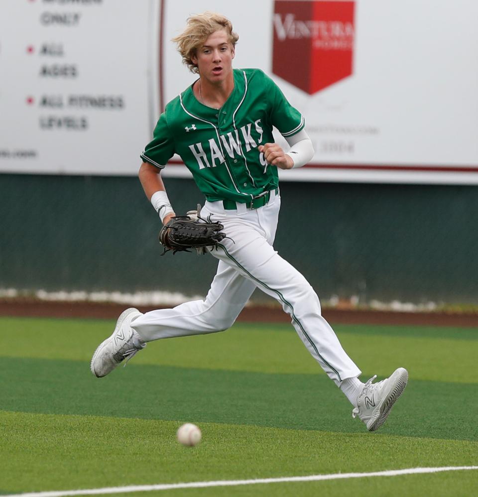 Wall’s Kellan Oliver (9) runs down a ball hit into the right field in the first inning in the third game of a best-of-three Region I-3A semifinal series against Bushland on Saturday, May 27, 2023, at Lubbock-Cooper’s Pirate Field at First United Park.