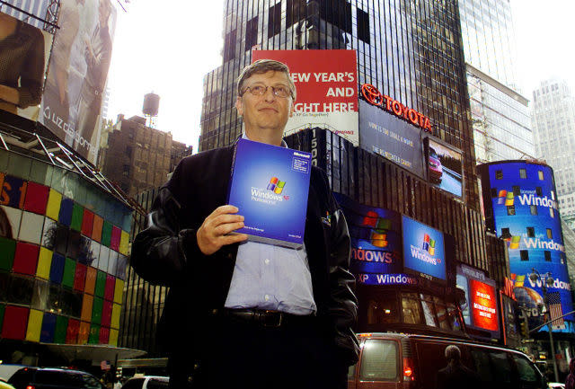 bill gates holding windows xp