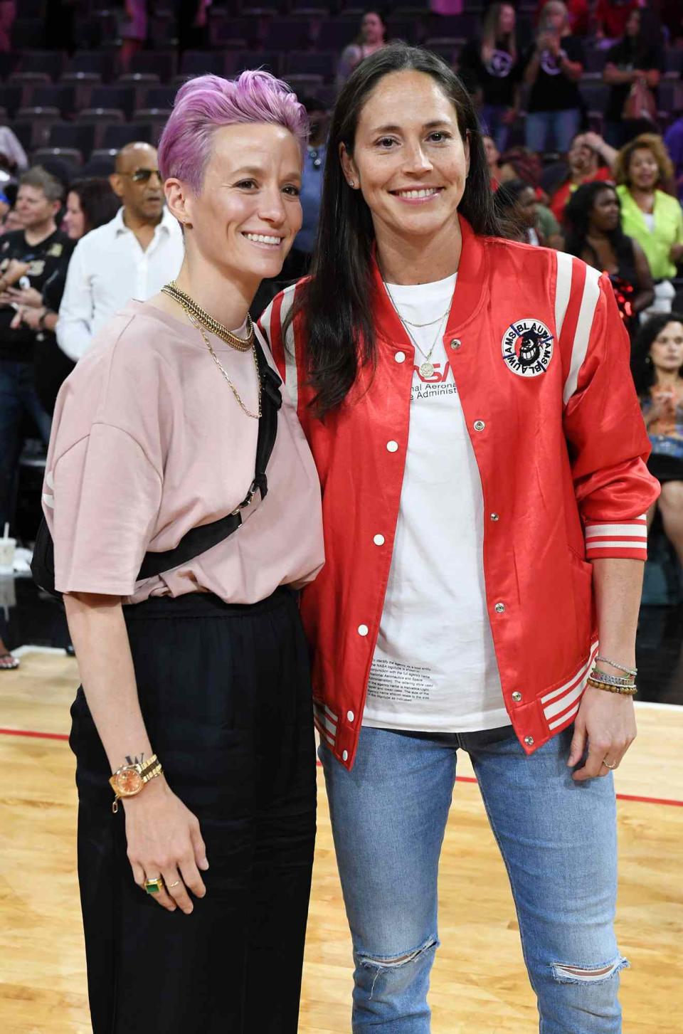 Megan Rapinoe (L) and Sue Bird of the Seattle Storm pose for photos on the court after attending the WNBA All-Star Game 2019 at the Mandalay Bay Events Center on July 27, 2019 in Las Vegas, Nevada. NOTE TO USER: User expressly acknowledges and agrees that, by downloading and or using this photograph, User is consenting to the terms and conditions of the Getty Images License Agreement