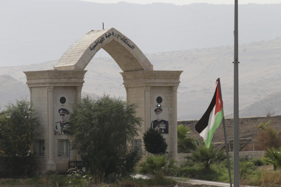 A Jordanian flag flies on a bridge leading from Israel to Jordan, in the Jordan valley area called Baqura, Jordanian territory that was leased to Israel under the 1994 peace agreement between the two countries, Monday, Oct. 22, 2018. Jordan's King Abdullah II on Sunday said he has decided not to renew the lease on two small areas of Baqura and Ghamr, that was part of his country's landmark peace treaty with Israel. The leases expire next year after 25 years. (AP Photo/Ariel Schalit)