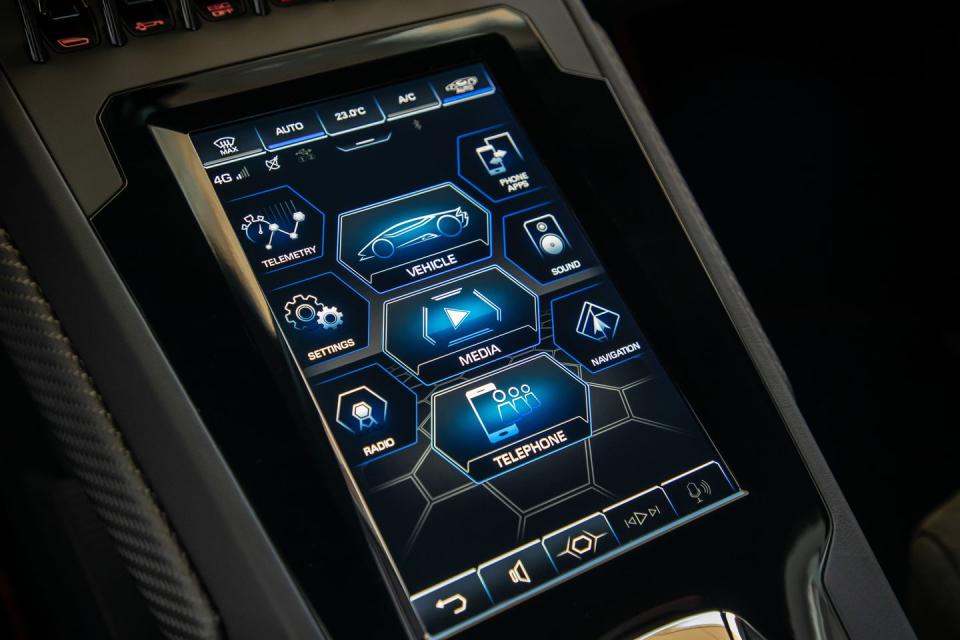 <p>It's one of life's great ironies that the price of a car and the quality of its infotainment system are typically inversely related. Lamborghini is making strides to address that with the Evo's new vertically oriented 8.4-inch touchscreen in the center console.</p>
