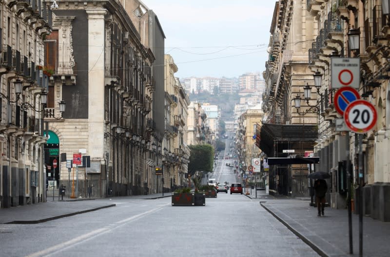 A deserted street is pictured, after Italy reinforced the lockdown measures to combat the coronavirus disease (COVID-19) in Catania