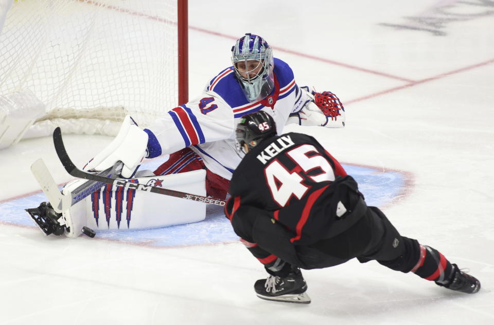 New York Rangers goaltender Jaroslav Halak (41) stops a shot by Ottawa Senators' Parker Kelly (45) during the third period of an NHL hockey game, Wednesday, Nov. 30, 2022 in Ottawa, Ontario. (Patrick Doyle/The Canadian Press via AP)